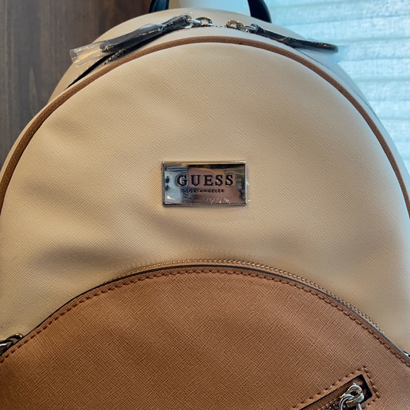 White and tan Guess backpack - Picture 2 of 6